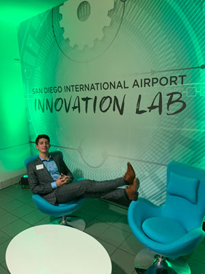 Delgadillo relaxes at the Innovation Lab located at the San Diego International Airport after a student competition.