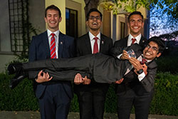 The winning team of SDSU students enjoy their victory. Front: Satya Bhambhani, Back, from left: Jack Kagan, Ashrith Reddy and Juan Francisco Frias Carazo.