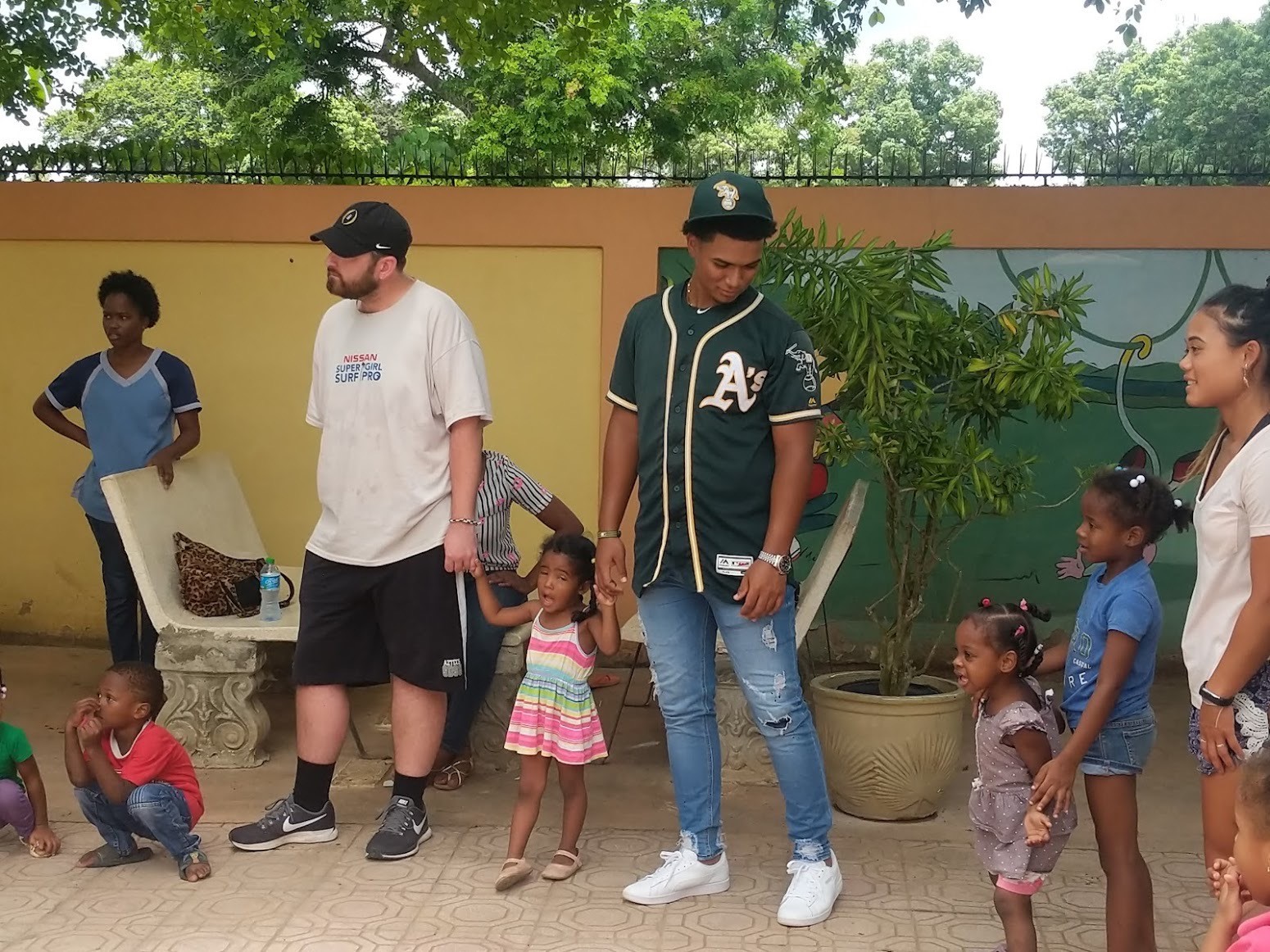 Kyle Robb supporting Oakland Athletics Baseball Academy community service during the Sports MBA's international trip to the Dominican Republic. 