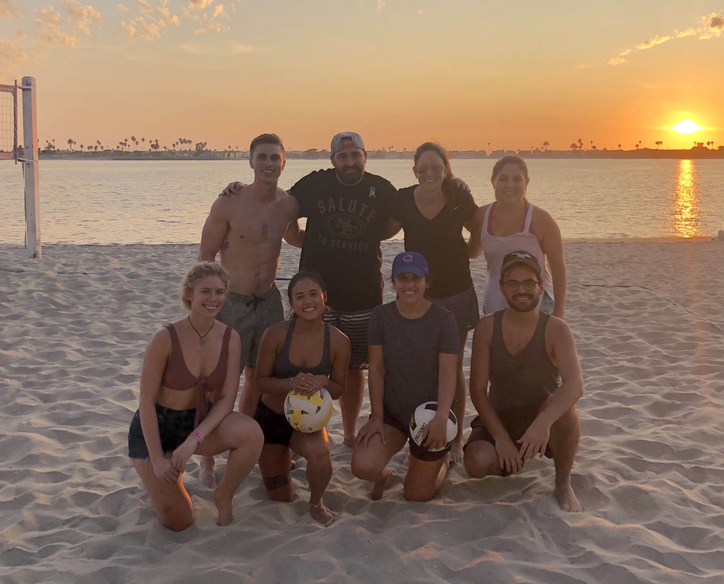 Morgan poses with fellow SMBA '20 classmates during their Monday night beach volleyball tradition. 