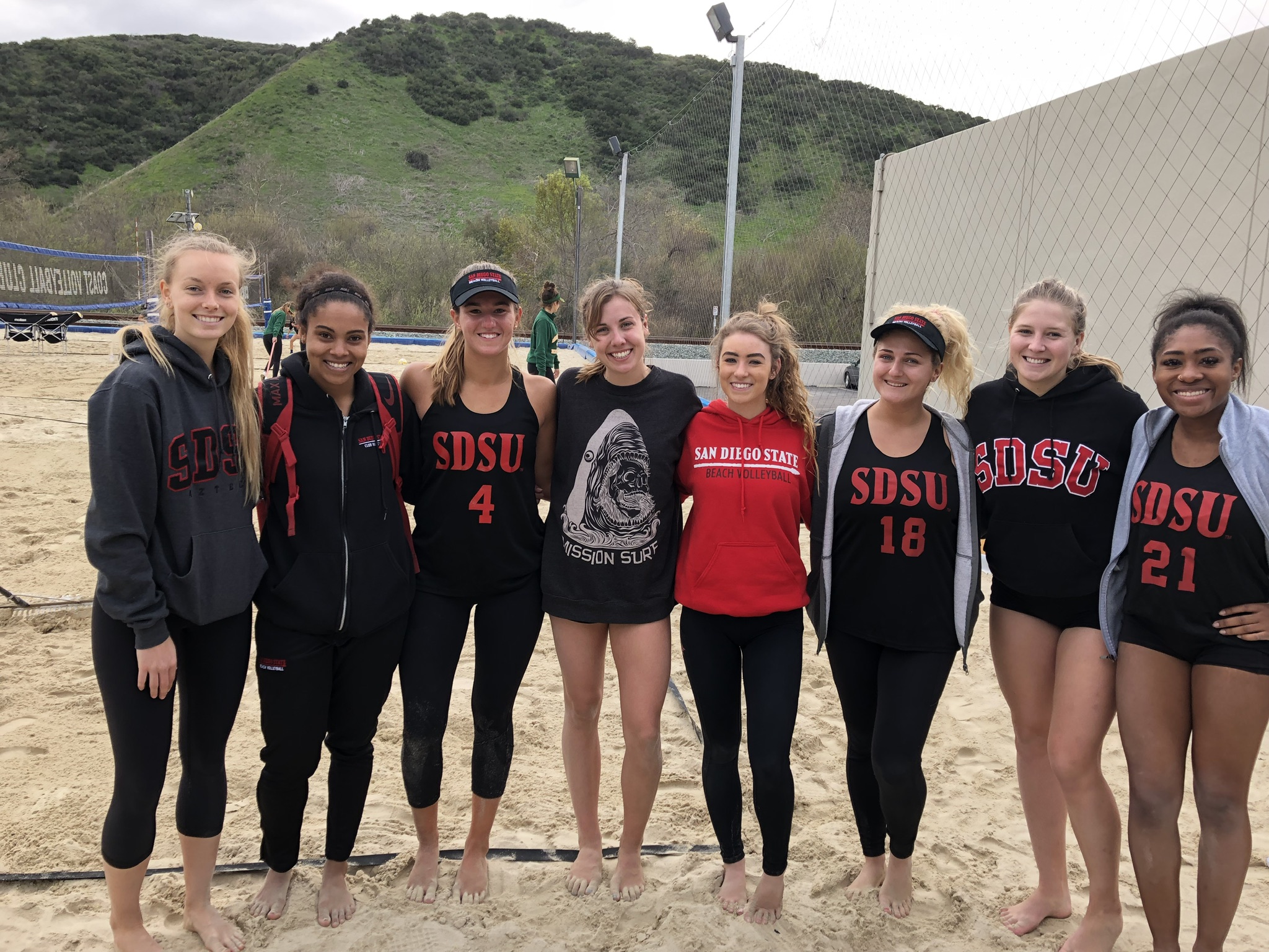 Nina Capuani (third from right) photographed with her Club Beach Volleyball Team.