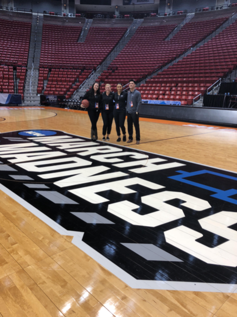 Tatum Lockett, second from right, with her SMBA classmates at the NCAA Tournament.