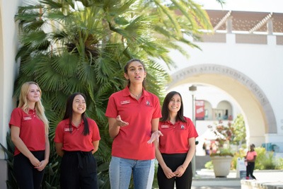 Kimoto and other fellow ambassadors at the annual Aztec Family Weekend where she checked in the parents/guardians at their respective events.