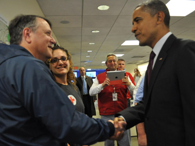 Jim Reisweber greets Barack Obama who visited the national headquarters of the Red Cross during his presidency. 