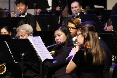 Soriano playing flute in the SDSU Symphonic Band.