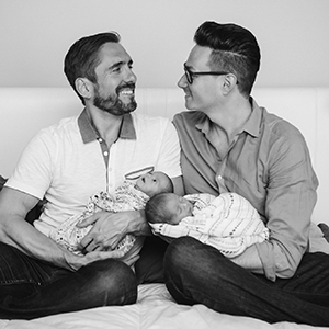 Steven Shyne and partner with their babies