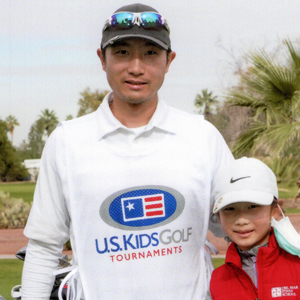 Wang and daughter Emma at Golf Tournament