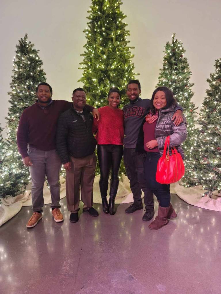 My family and I at a Christmas event. Fun fact, my younger brother Nnamdi (pictured to my right) is also an SDSU alum ('20)!