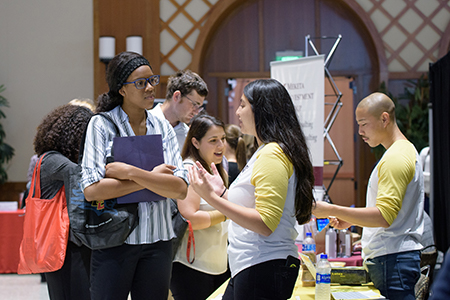 Students networking at a career fair