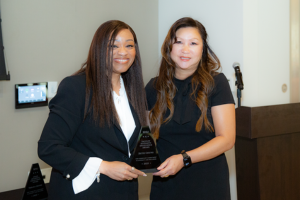 Beth Chung receiving the 2023 Diversity Excellence Award from Senior AVP for Student Affairs and Campus Diversity, Aniesha Mitchell