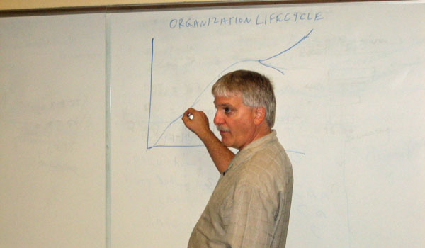 DeNoble during one of his classroom lectures in 2008