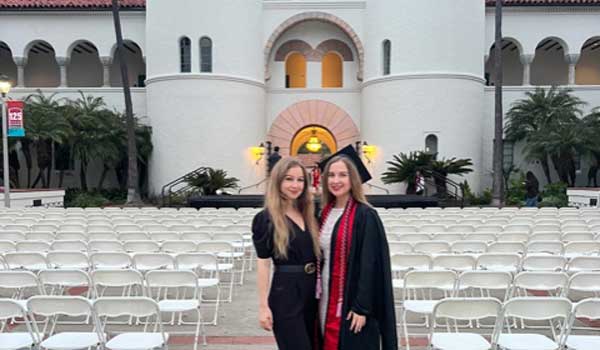 Claudia (left) and Caroline at graduation in 2023