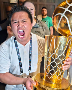 Tran with the Larry O’Brien Championship Trophy