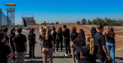 SMBA students observing the BMX track