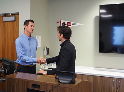 Connor Virjee (SMBA '26) speaking with Intuit's Conner Comp