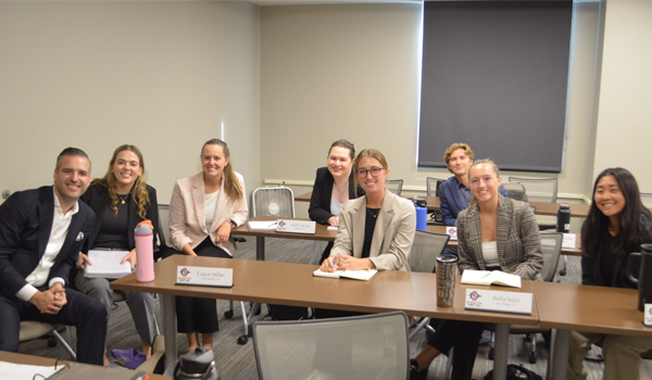 Sean Bell (SMBA '17) with students