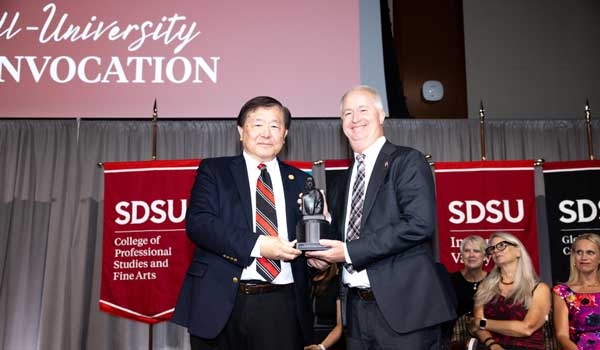 SDSU provost Bill Tong (left) with accounting professor Steve Gill